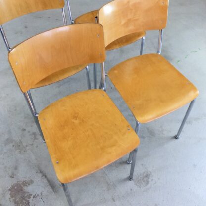 4 vintage stacking chairs