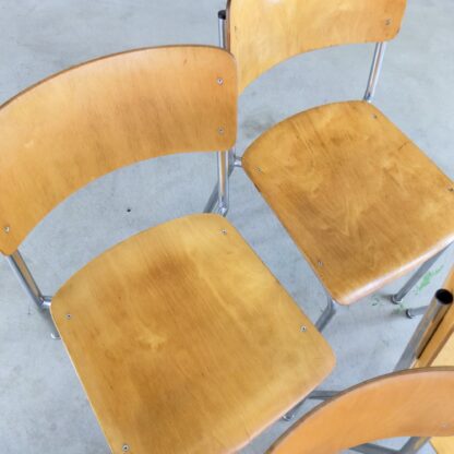 4 vintage stacking chairs