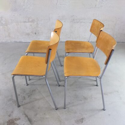4 vintage stacking chairs