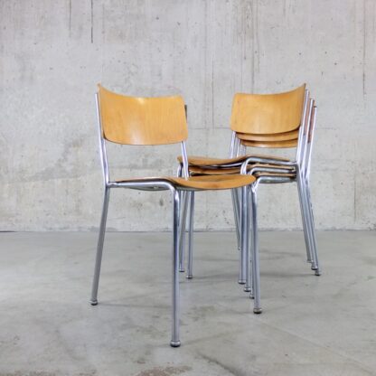 4 vintage stacking chairs