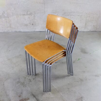 4 vintage stacking chairs