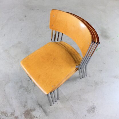 4 vintage stacking chairs